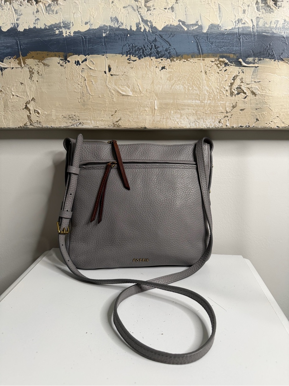 Fossil Gray Pebbled Leather Crossbody with Brown Tassel Accents